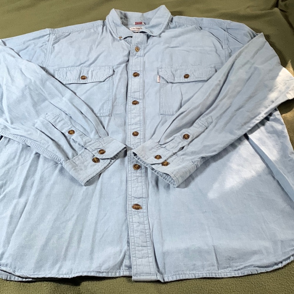 Men’s Carhartt blue, long sleeve shirt.  Size XL. Chest approx 25 1/2 inches